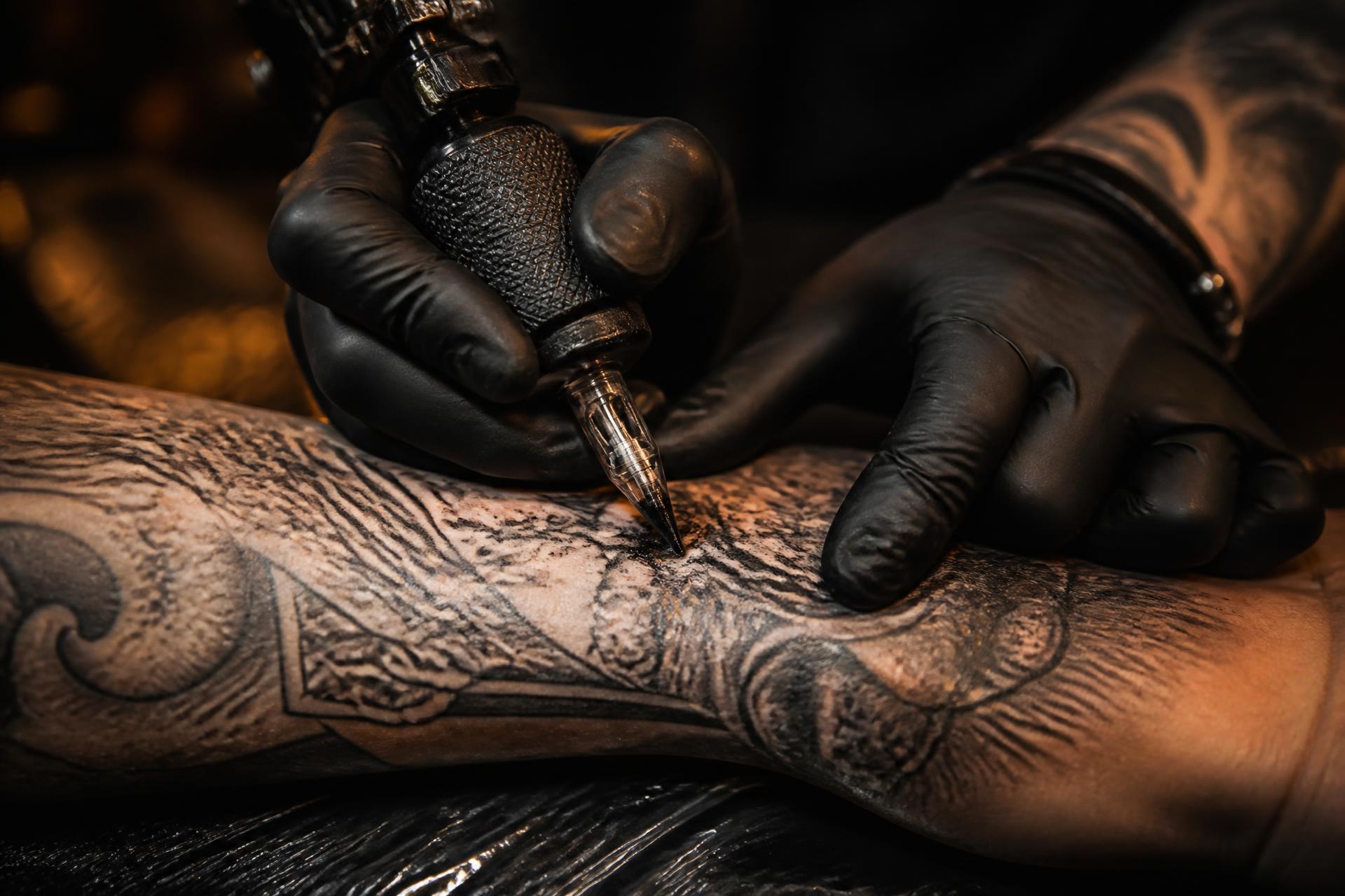 Tattoo artist at work